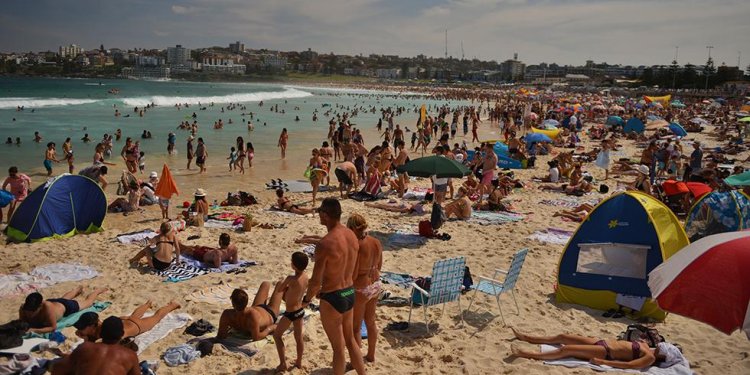 People enjoy the hot weather