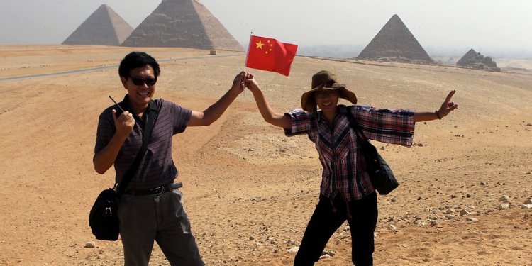 Chinese tourists posing in