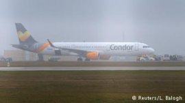 A Condor airplane stands on a tarmac in Budapest, after a bomb risk pushed it in order to make a crisis landing.
