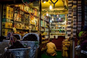 a store owner prays inside their store in the Old marketplace area in Sharm El Sheikh, Egypt