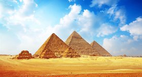 Giza area with Great pyramids with blue cloudy sky