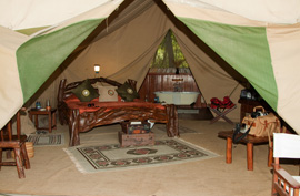 the inner of a luxury safari tent lodge in africa