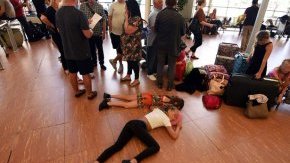 Tourists wait within airport of Egypt's Red water resort of Sharm El-Sheikh